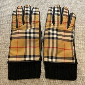 Brand new Burberry Women’s Nova Check gloves with black lamb leather.  Size 8.
